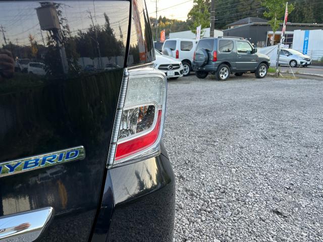 フリードハイブリッド ジャストセレクション ETC バックカメラ TV オートクルーズコントロール 両側スライド・片側電動 HID スマートキー 電動格納ミラー 3列シート CVT CD DVD再生 Bluetooth 盗難防止システム ABS(38枚目)