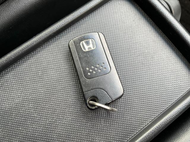 ステップワゴンスパーダ Z BT接続ナビ地デジBカメラ後席モニター両側電動ドアETC ビ TV 両側電動スライドドア HID スマートキー アイドリングストップ 電動格納ミラー 後席モニター 3列シート CVT(56枚目)