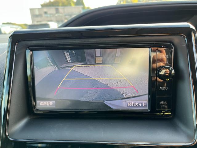 ヴォクシー ハイブリッドＶ　ＥＴＣ　バックカメラ　ナビ　ＴＶ　オートクルーズコントロール　両側電動スライドドア　オートライト　ＬＥＤヘッドランプ　スマートキー　電動格納ミラー　シートヒーター　３列シート　ＣＶＴ　アルミホイール（25枚目）