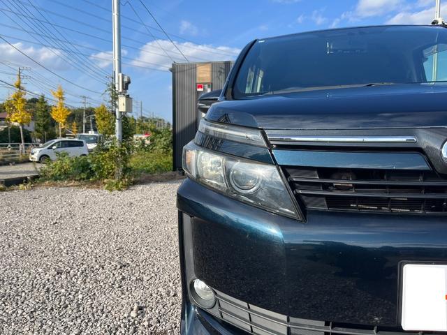 ヴォクシー ハイブリッドＶ　ＥＴＣ　バックカメラ　ナビ　ＴＶ　オートクルーズコントロール　両側電動スライドドア　オートライト　ＬＥＤヘッドランプ　スマートキー　電動格納ミラー　シートヒーター　３列シート　ＣＶＴ　アルミホイール（54枚目）