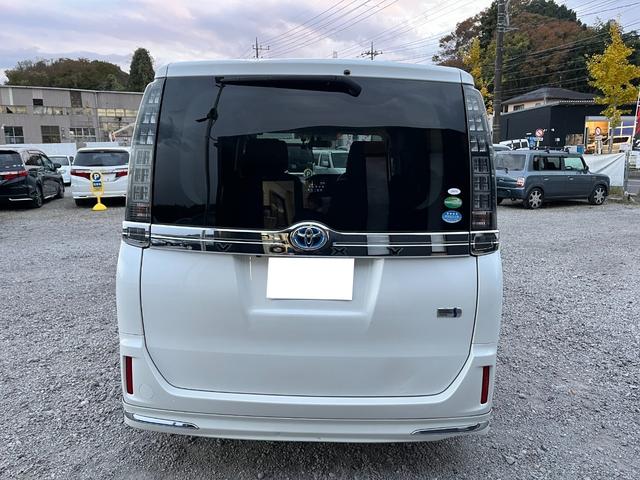 ヴォクシー ハイブリッドＶ　モデリスタエアロ両側電動ドアＬＥＤヘッドＥＴＣスマートキー　ＥＴＣ　オートクルーズコントロール　両側電動スライドドア　ＬＥＤヘッドランプ　スマートキー　電動格納ミラー　シートヒーター　３列シート（15枚目）