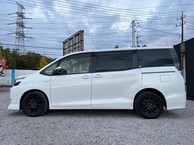 ヴォクシー ハイブリッドＶ　モデリスタエアロ両側電動ドアＬＥＤヘッドＥＴＣスマートキー　ＥＴＣ　オートクルーズコントロール　両側電動スライドドア　ＬＥＤヘッドランプ　スマートキー　電動格納ミラー　シートヒーター　３列シート（16枚目）