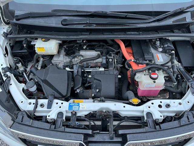 ヴォクシー ハイブリッドＶ　モデリスタエアロ両側電動ドアＬＥＤヘッドＥＴＣスマートキー　ＥＴＣ　オートクルーズコントロール　両側電動スライドドア　ＬＥＤヘッドランプ　スマートキー　電動格納ミラー　シートヒーター　３列シート（19枚目）
