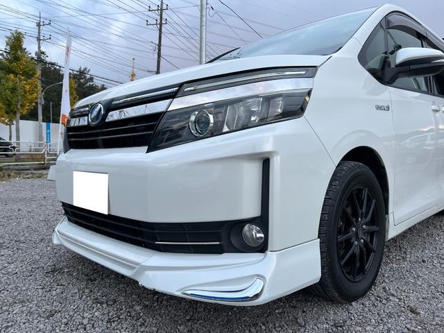 ヴォクシー ハイブリッドＶ　モデリスタエアロ両側電動ドアＬＥＤヘッドＥＴＣスマートキー　ＥＴＣ　オートクルーズコントロール　両側電動スライドドア　ＬＥＤヘッドランプ　スマートキー　電動格納ミラー　シートヒーター　３列シート（52枚目）