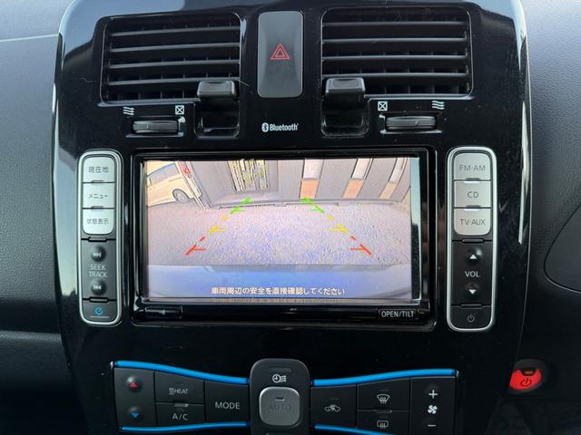 リーフ X(24kwh) ETC バックカメラ ナビ TV オートクルーズコントロール 衝突被害軽減システム スマートキー 電動格納ミラー シートヒーター CVT 盗難防止システム 衝突安全ボディ ABS ESC CD(3枚目)
