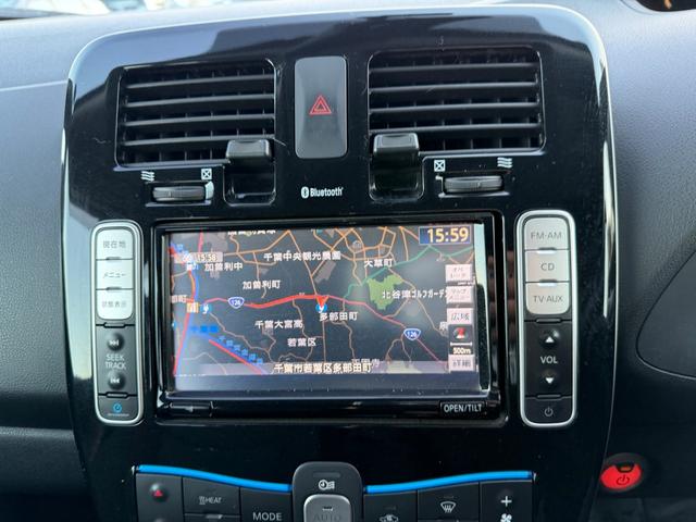 リーフ X(24kwh) ETC バックカメラ ナビ TV オートクルーズコントロール 衝突被害軽減システム スマートキー 電動格納ミラー シートヒーター CVT 盗難防止システム 衝突安全ボディ ABS ESC CD(4枚目)