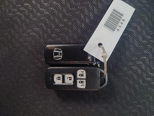 Ｎ－ＢＯＸカスタム Ｇ　ターボＳＳパッケージ　車検Ｒ９年１１月　Ｅ／Ｇオイル交換済み　ＥＴＣ　バックカメラ　両側電動スライドドア　ナビ　ＴＶ　オートクルーズコントロール　オートライト　ＨＩＤ　スマートキー×２　アイドリングストップ　シートヒーター（22枚目）