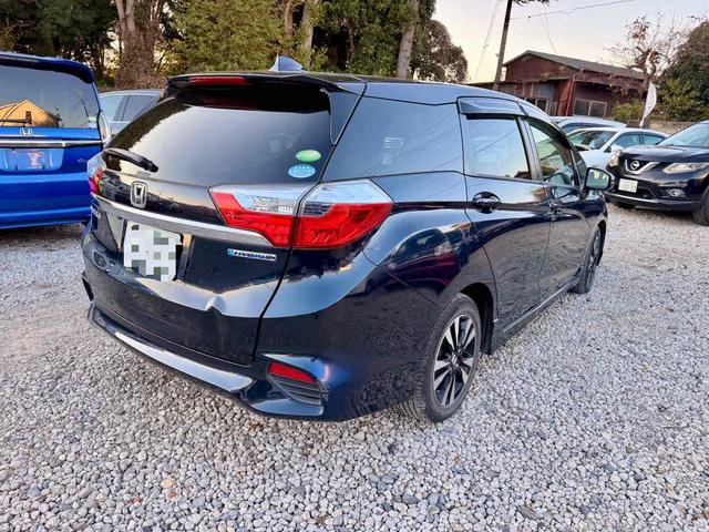 シャトル ハイブリッドＸ　バックカメラ　ナビ　ＴＶ　オートクルーズコントロール　衝突被害軽減システム　アルミホイール　ＬＥＤヘッドランプ　スマートキー　ＡＴ　盗難防止システム　衝突安全ボディ　ＡＢＳ　ＥＳＣ　エアコン（14枚目）