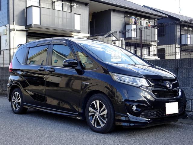 フリード+ハイブリッド ハイブリッドEX 車検9年11月 ホンダセンシング レーダークルーズ 衝突軽減ブレーキ ナビ TV DVD再生機能 Bluetooth 後席モニター バックカメラ 両側パワスラ スマートキー エアロ LED ETC(4枚目)