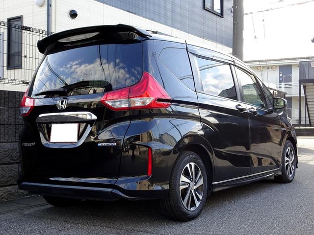 フリード+ハイブリッド ハイブリッドEX 車検9年11月 ホンダセンシング レーダークルーズ 衝突軽減ブレーキ ナビ TV DVD再生機能 Bluetooth 後席モニター バックカメラ 両側パワスラ スマートキー エアロ LED ETC(5枚目)