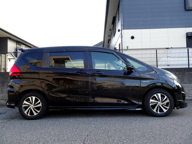 フリード+ハイブリッド ハイブリッドEX 車検9年11月 ホンダセンシング レーダークルーズ 衝突軽減ブレーキ ナビ TV DVD再生機能 Bluetooth 後席モニター バックカメラ 両側パワスラ スマートキー エアロ LED ETC(8枚目)