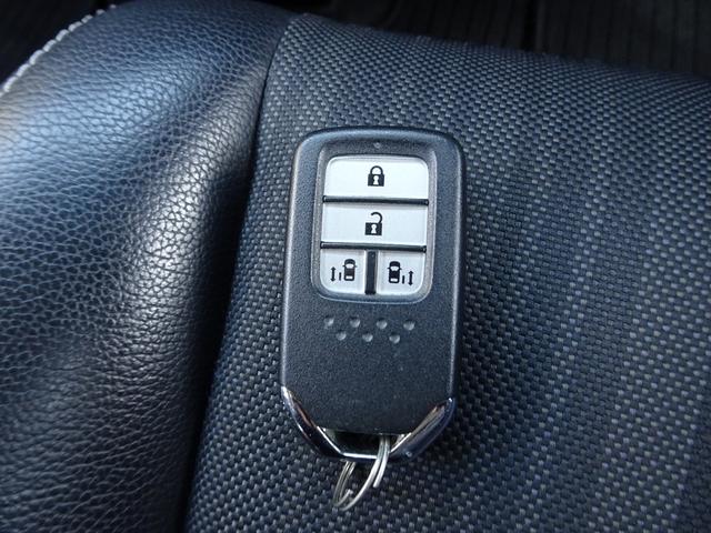 フリード+ハイブリッド ハイブリッドEX 車検9年11月 ホンダセンシング レーダークルーズ 衝突軽減ブレーキ ナビ TV DVD再生機能 Bluetooth 後席モニター バックカメラ 両側パワスラ スマートキー エアロ LED ETC(25枚目)