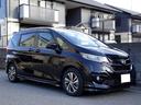 フリード+ハイブリッド ハイブリッドEX 車検9年11月 ホンダセンシング レーダークルーズ 衝突軽減ブレーキ ナビ TV DVD再生機能 Bluetooth 後席モニター バックカメラ 両側パワスラ スマートキー エアロ LED ETC(4枚目)