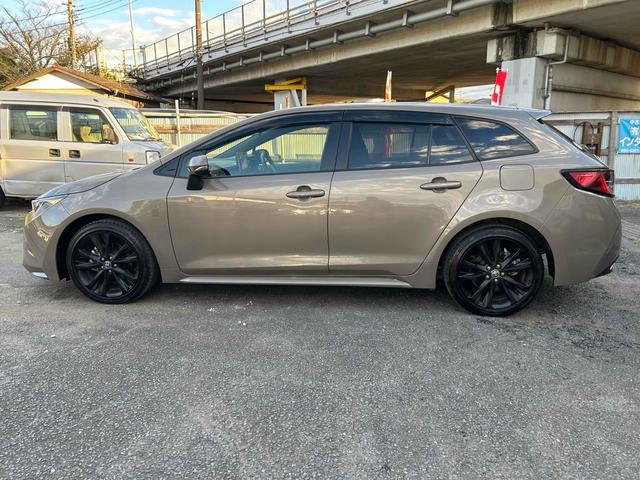 カローラツーリング ハイブリッド　ダブルバイビー５０ミリオンエディション　ＥＴＣ　バックカメラ　ナビ　ＴＶ　クリアランスソナー　オートクルーズコントロール　レーンアシスト　衝突被害軽減システム　アルミホイール　オートマチックハイビーム　ＬＥＤヘッドランプ　スマートキー（16枚目）