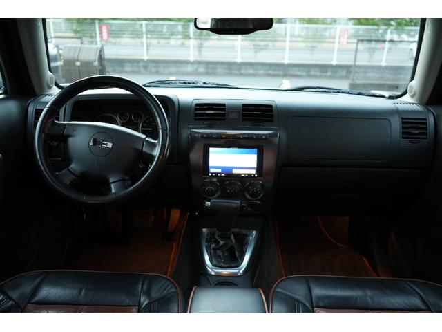 ハマーＨ３ 　タイプＧ　左ハンドル　サンルーフ　正規ディーラー車（保証書＆取説）　ツートンレザーシート　パワーシート　社外ナビ　Ｂｌｕｅｔｏｏｔｈ　Ｂカメラ　記録簿　ＴＶ（3枚目）