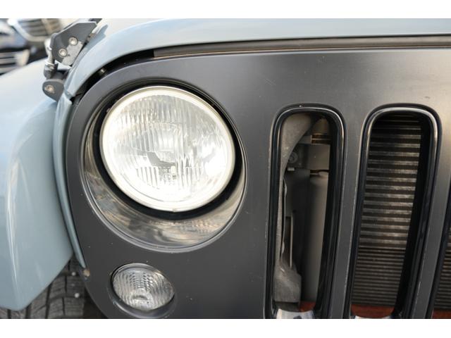 ジープ・ラングラーアンリミテッド アルティテュード 限定車 社外4本出しマフラー バンパーガード 社外リアバンパー 社外ナビBluetooth Bカメラ シートヒーター 社外サイドステップ ブラックレザーシート リアナンバープレート移植(17枚目)
