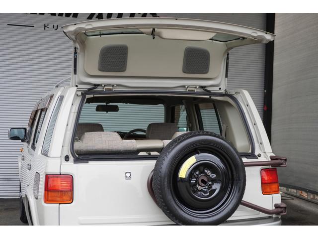 ラシーン タイプＩＩ　ウッドパネル　ｃａｒｒｏｚｚｅｒｉａオーディオ　社外アルミ　ルーフレール　スペアタイヤキャリア　ＹＯＫＯＨＡＭＡタイヤ　１５００ＣＣ（60枚目）