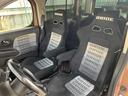 キューブ 　左ハンドル　ＣＡＲＦＡＸ有　ＢＲＩＤＥセミバケ　ＴＡＫＥＤＡパワーインテーク　ＪＰヘッドライト，リアバンパー　ｍｏｍｏステアリング　ダイヤトーンナビ　Ｂｌｕｅｔｏｏｔｈ　ＥＴＣ（6枚目）