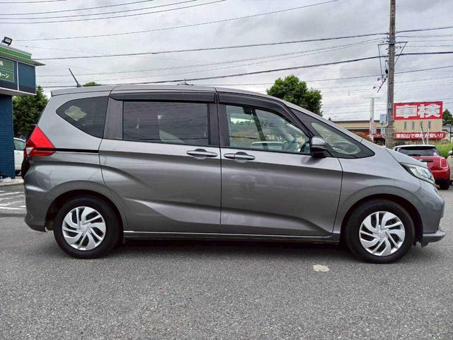 フリード Ｇ・ホンダセンシング　純正９インチナビ／純正フリップダウンモニター／両側電動スライドドア／ＥＴＣ／バックカメラ／６人乗り（3枚目）