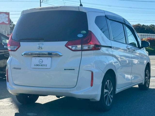 フリードハイブリッド ハイブリッド・Gホンダセンシング 純正9インチナビ フルセグTV バックモニター ETC 両側電動スライドドア ホンダセンシング シートヒーター 4WD(5枚目)