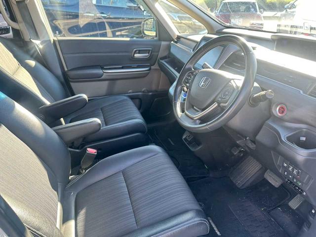 フリードハイブリッド ハイブリッド・Gホンダセンシング 純正9インチナビ フルセグTV バックモニター ETC 両側電動スライドドア ホンダセンシング シートヒーター 4WD(7枚目)