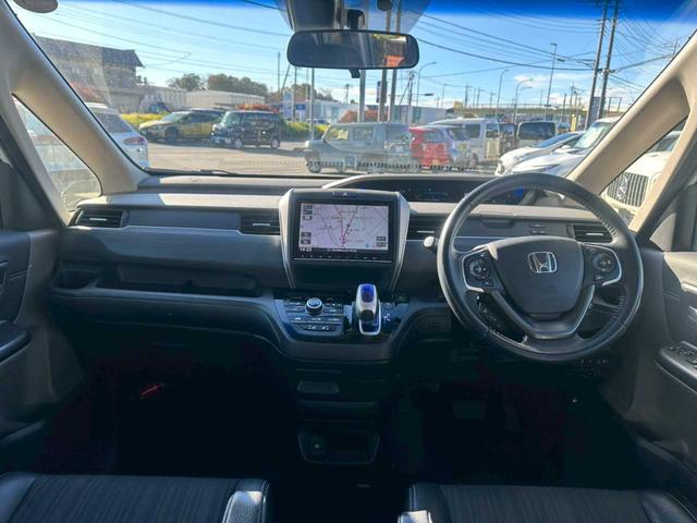 フリードハイブリッド ハイブリッド・Gホンダセンシング 純正9インチナビ フルセグTV バックモニター ETC 両側電動スライドドア ホンダセンシング シートヒーター 4WD(9枚目)