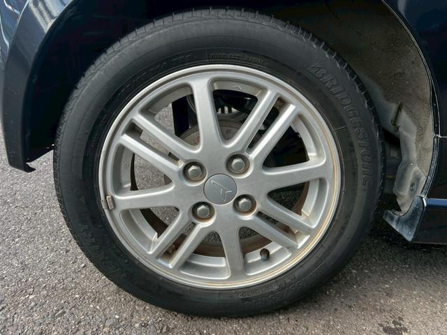 ムーヴ カスタム　Ｘリミテッド　車検令和８年１０月／純正オーディオ／ＥＴＣ／オーバーヘッドコンソール／ＨＩＤヘッドライト／オートエアコン／純正アルミホイール／フォグ／アクセサリーソケット／電動格納ミラー／シートリフター／スマートキー（43枚目）