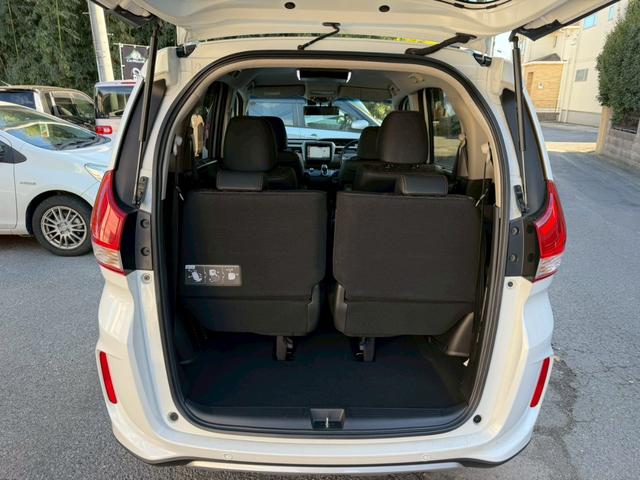 フリードハイブリッド ハイブリッド・クロスターホンダセンシング　純正ナビ　フルセグＴＶ　純正フリップダウンモニター　両側電動スライドドア　純正アルミホイール　バックモニター　ＥＴＣ（21枚目）