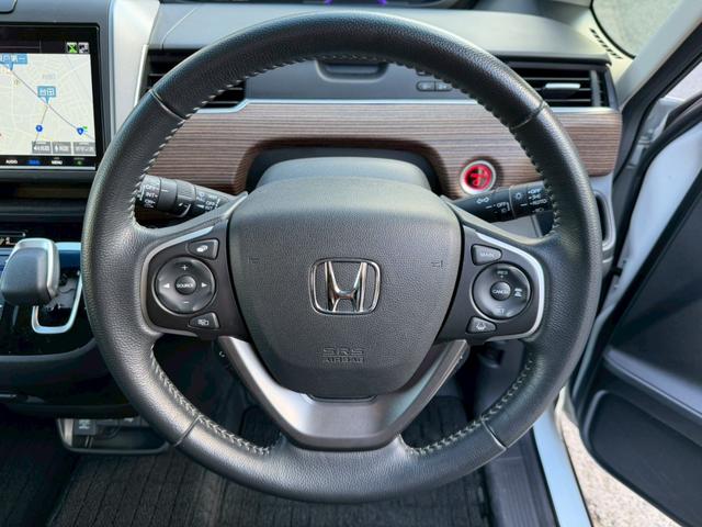 フリードハイブリッド ハイブリッド・クロスターホンダセンシング　純正ナビ　フルセグＴＶ　純正フリップダウンモニター　両側電動スライドドア　純正アルミホイール　バックモニター　ＥＴＣ（27枚目）