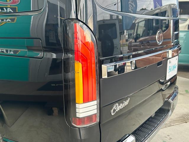 ハイエースバン スーパーＧＬ　ダークプライムＩＩ　Ｃａｌ’ｓＭｏｔｏｒプロデュース　ＣＡＲＩＣＡ　ユーロスタイル　ベットキット付き　純正ナビ　バックカメラ　ＥＴＣ　カーフィルム５面　ＴＲＤ（１５インチアルミホイール）　純正スチールホイール付き（16枚目）