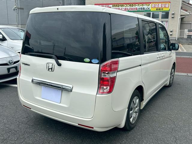 ステップワゴン L ETC バックカメラ ナビ TV 両側電動スライドドア オートライト HID スマートキー 電動格納ミラー 3列シート ウォークスルー CVT 盗難防止システム 衝突安全ボディ ABS エアコン(3枚目)