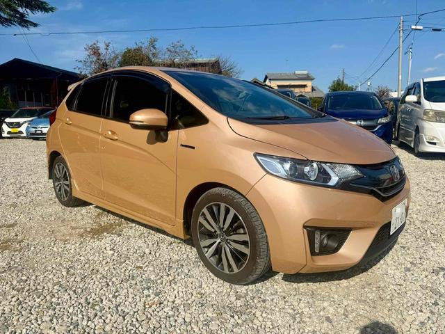 フィットハイブリッド Ｓパッケージ　ハイブリッド　ナビ　ＴＶ　オートクルーズコントロール　オートライト　ＬＥＤヘッドランプ　スマートキー　電動格納ミラー　ＡＴ　盗難防止システム　衝突安全ボディ　アルミホイール　ＡＢＳ　ＥＳＣ　エアコン（10枚目）