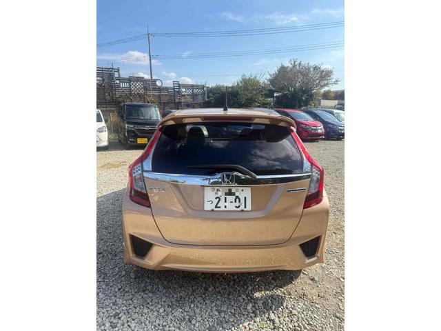 フィットハイブリッド Ｓパッケージ　ハイブリッド　ナビ　ＴＶ　オートクルーズコントロール　オートライト　ＬＥＤヘッドランプ　スマートキー　電動格納ミラー　ＡＴ　盗難防止システム　衝突安全ボディ　アルミホイール　ＡＢＳ　ＥＳＣ　エアコン（12枚目）