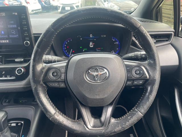 カローラツーリング ハイブリッド　ダブルバイビー　トヨタセーフティセンス　ＢＳＭ　ディスプレイオーディオ　Ｂｌｕｅｔｏｏｔｈ　フルセグＴＶ　オートライト　オートハイビーム　ＥＴＣ　ハーフレザーシート　シートヒーター　ハンドルヒーター　レーダークルコン（5枚目）
