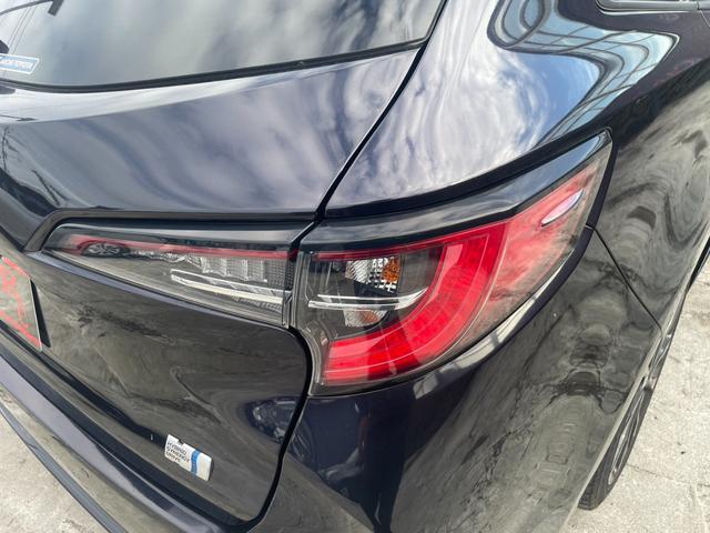 カローラツーリング ハイブリッド　ダブルバイビー　トヨタセーフティセンス　ＢＳＭ　ディスプレイオーディオ　Ｂｌｕｅｔｏｏｔｈ　フルセグＴＶ　オートライト　オートハイビーム　ＥＴＣ　ハーフレザーシート　シートヒーター　ハンドルヒーター　レーダークルコン（52枚目）