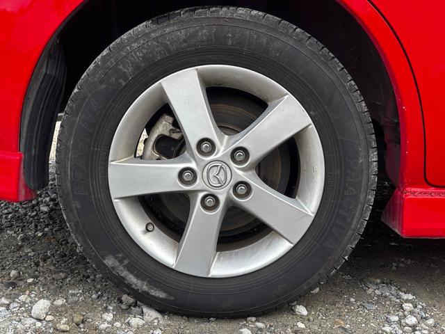 プレマシー ２０Ｓ　ＥＴＣ　クリアランスソナー　両側電動スライドドア　ＨＩＤ　スマートキー　電動格納ミラー　３列シート　フルフラット　オットマン　ＡＴ　アルミホイール　ＣＤ　盗難防止システム　衝突安全ボディ　ＡＢＳ（24枚目）