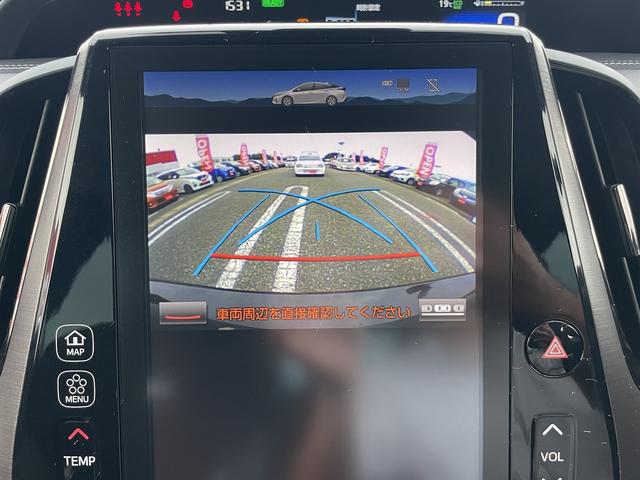 プリウスＰＨＶ Ｓナビパッケージ・ＧＲスポーツ　ＳＤナビゲーションシステム　フルセグテレビ　ＢＬＵＥＴＯＯＴＨ　バックカメラ　前席シートヒーター　ステアリングスイッチ　クルーズコントロール　ＡＣ１００Ｖ電源　ＥＴＣ２．０　スマートキー　フォグランプ（4枚目）