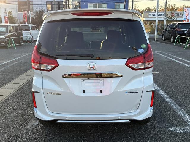 フリードハイブリッド ハイブリッド・クロスターホンダセンシング SDナビゲーションシステム フルセグテレビ BLUETOOTH バックカメラ スマートキー プッシュスタート ETC クルーズコントロール 前席シートヒーター 両側電動スライドドア LEDヘッドライト(10枚目)