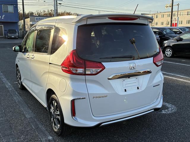 フリードハイブリッド ハイブリッド・クロスターホンダセンシング SDナビゲーションシステム フルセグテレビ BLUETOOTH バックカメラ スマートキー プッシュスタート ETC クルーズコントロール 前席シートヒーター 両側電動スライドドア LEDヘッドライト(11枚目)