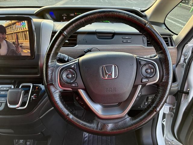 フリードハイブリッド ハイブリッド・クロスターホンダセンシング SDナビゲーションシステム フルセグテレビ BLUETOOTH バックカメラ スマートキー プッシュスタート ETC クルーズコントロール 前席シートヒーター 両側電動スライドドア LEDヘッドライト(38枚目)