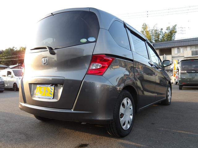 フリード G Lパッケージ 車検2年付き 8人乗り 電動スライドドア メモリーナビ/CD/DVD/Bluetooth/フルセグTV バックカメラ ETC(9枚目)