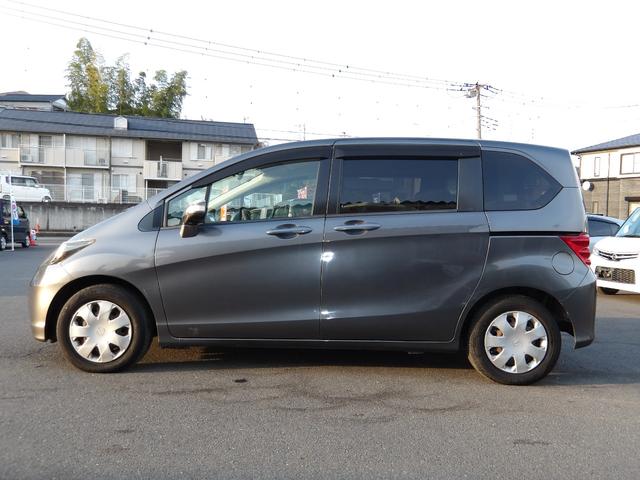 フリード G Lパッケージ 車検2年付き 8人乗り 電動スライドドア メモリーナビ/CD/DVD/Bluetooth/フルセグTV バックカメラ ETC(11枚目)