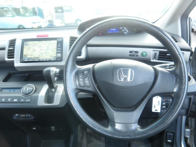 フリード Ｇ　ジャストセレクション　８人乗り　車検２年付き　ＨＤＤナビ／ＣＤ／ＤＶＤ／ＭＳＶ／ワンセグ　バックカメラ　ＥＴＣ　電動スライドドア　キーレスキー（26枚目）