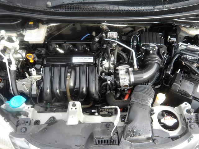 フィットハイブリッド Ｆパッケージ　車検２年付き　ＨＤＤナビ／ＣＤ／ＤＶＤ／Ｂｌｕｅｔｏｏｔｈ／ＭＳＶ／フルセグＴＶ　バックカメラ　ＥＴＣ　ブレーキサポート　横滑り防止　スマートキー　プッシュスタート（12枚目）