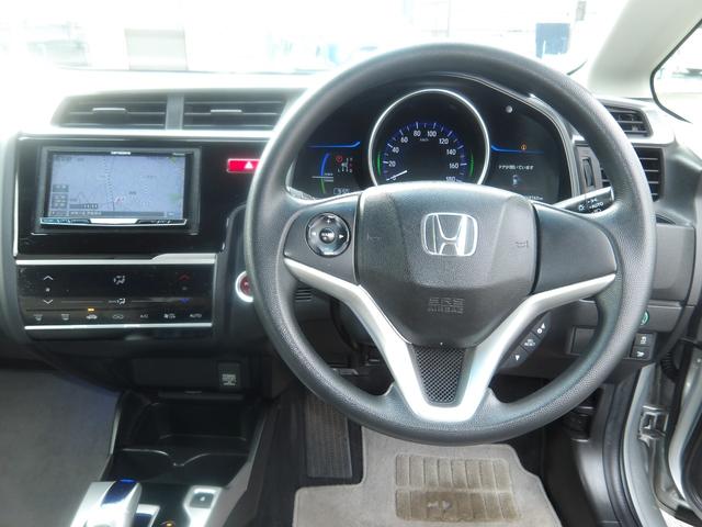 フィットハイブリッド Ｆパッケージ　車検２年付き　ＨＤＤナビ／ＣＤ／ＤＶＤ／Ｂｌｕｅｔｏｏｔｈ／ＭＳＶ／フルセグＴＶ　バックカメラ　ＥＴＣ　ブレーキサポート　横滑り防止　スマートキー　プッシュスタート（21枚目）