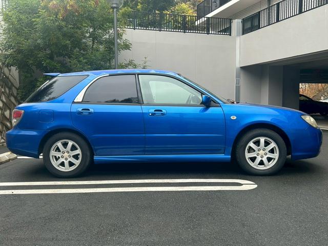 インプレッサスポーツワゴン １．５ｉ　ユーザー買取車／社外ナビ／テレビ／ＥＴＣ／純正アルミ１５インチ／運転席エアバック／パワーステアリング／オートエアコン／キーレスキー（4枚目）