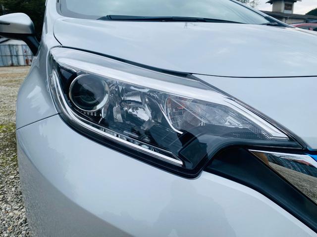 ノート e-パワー X クリソナ BTオーディオ 禁煙 オートライ 横滑防止装置 Rカメラ 運転席助手席エアバック 地デジ AUTOエアコン AUX接続 オートハイビーム 盗難防止システム 衝突安全ボディ ナビTV パワステ(44枚目)