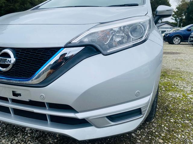 ノート e-パワー X クリソナ BTオーディオ 禁煙 オートライ 横滑防止装置 Rカメラ 運転席助手席エアバック 地デジ AUTOエアコン AUX接続 オートハイビーム 盗難防止システム 衝突安全ボディ ナビTV パワステ(49枚目)