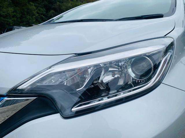 ノート e-パワー X クリソナ BTオーディオ 禁煙 オートライ 横滑防止装置 Rカメラ 運転席助手席エアバック 地デジ AUTOエアコン AUX接続 オートハイビーム 盗難防止システム 衝突安全ボディ ナビTV パワステ(50枚目)