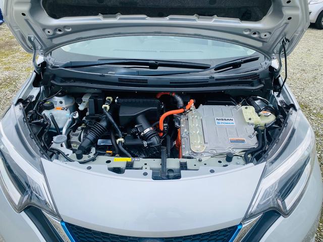 ノート e-パワー X クリソナ BTオーディオ 禁煙 オートライ 横滑防止装置 Rカメラ 運転席助手席エアバック 地デジ AUTOエアコン AUX接続 オートハイビーム 盗難防止システム 衝突安全ボディ ナビTV パワステ(63枚目)